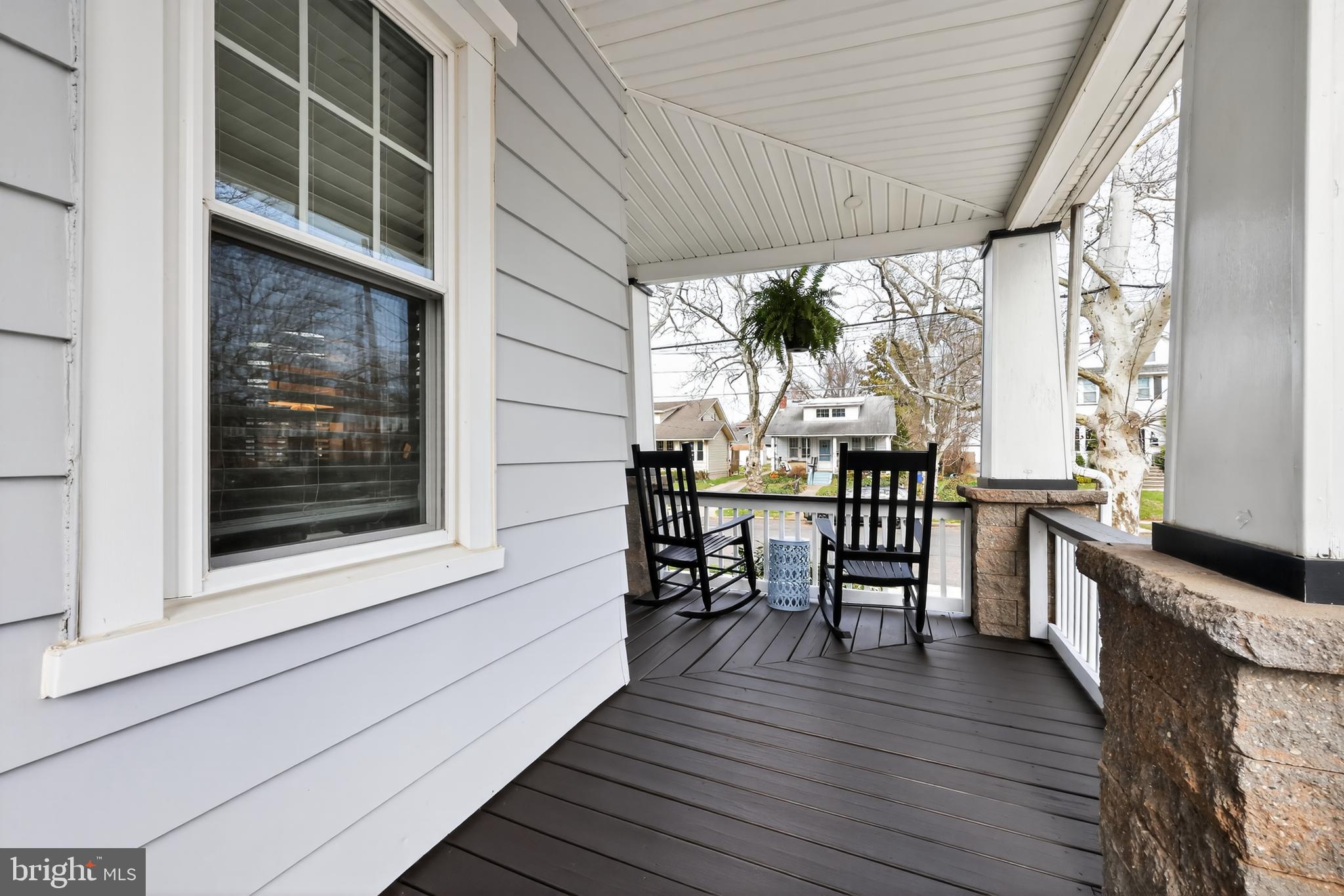 208 Richey Avenue Collingswood, NJ 08107 - Photo 5 of 35 a view of a balcony with chairs and wooden floor