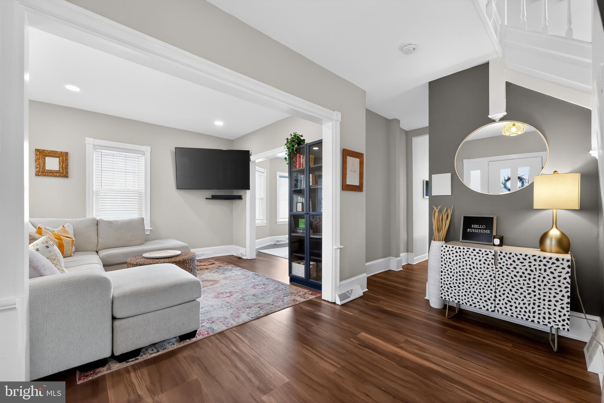 208 Richey Avenue Collingswood, NJ 08107 - Photo 6 of 35 a living room with furniture and a flat screen tv