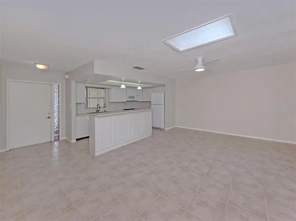 a view of a kitchen with a sink