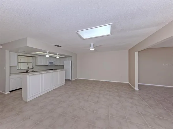 a view of cabinets and kitchen