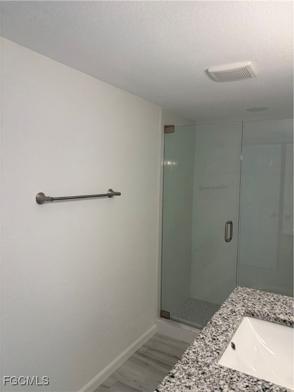 16881 Davis Road, Unit 414 Fort Myers, FL 33908 - Photo 12 of 24 a bathroom with a bathtub and shower
