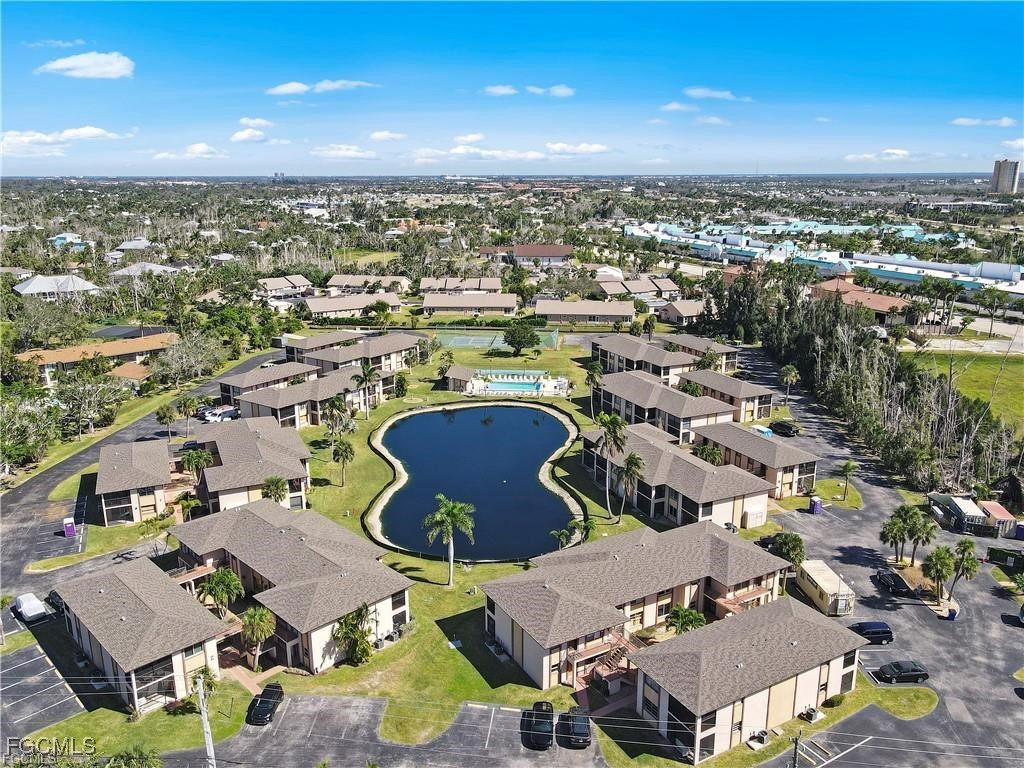 16881 Davis Road, Unit 414 Fort Myers, FL 33908 - Photo 3 of 24 an aerial view of a city