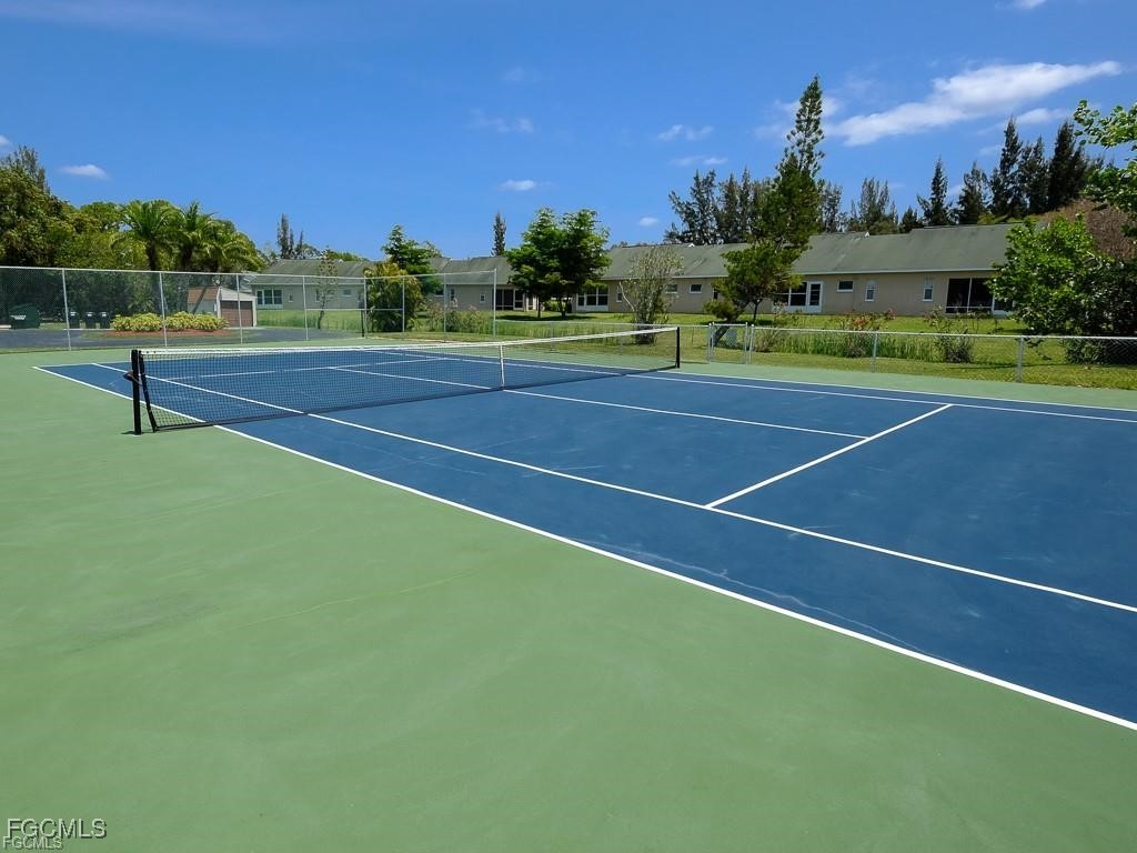 16881 Davis Road, Unit 414 Fort Myers, FL 33908 - Photo 5 of 24 a view of a tennis court