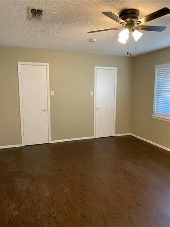 a utility room with a sink a mirror and vanity