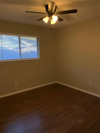 a view of hallway with windows