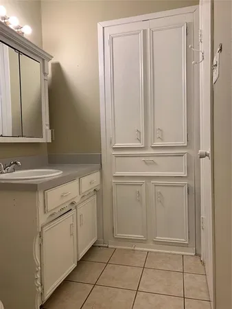 a bathroom with a toilet and a bathtub