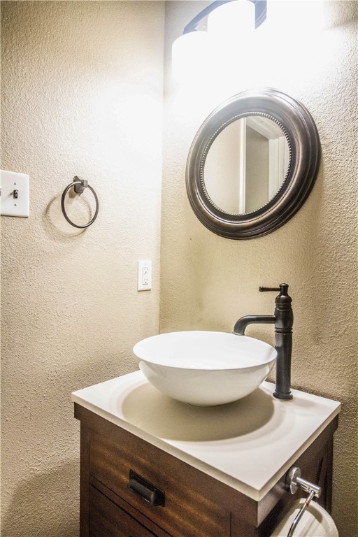 413 Moorhen Cove Leander, TX 78641 - Photo 12 of 18 a bathroom with a sink and a mirror