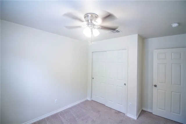 a view of a chandelier fan