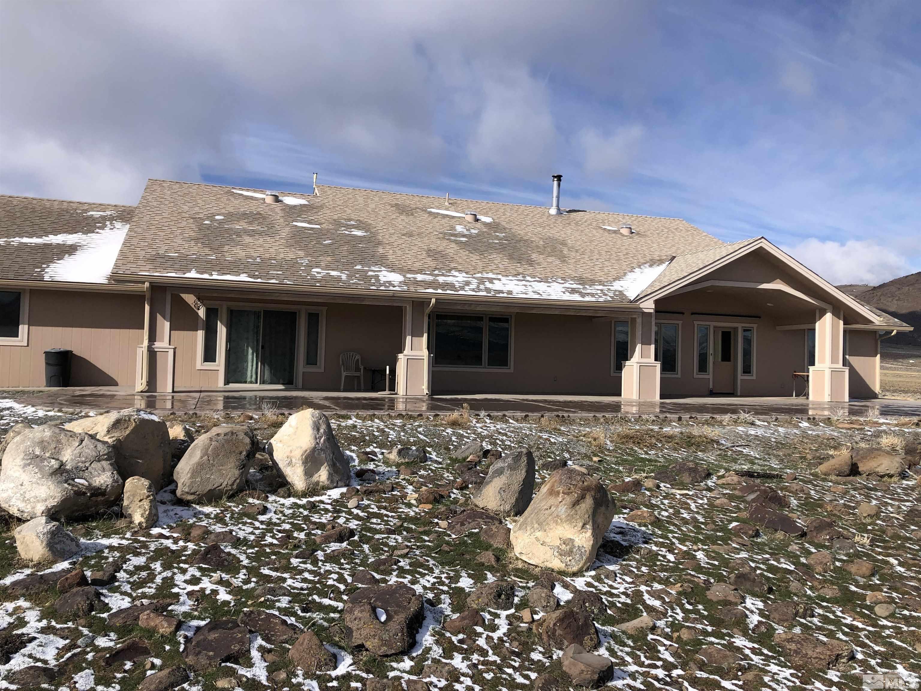 3355 Basque Oven Road Reno, NV 89510 - Photo 8 of 40 a view of a house with a yard and sitting area