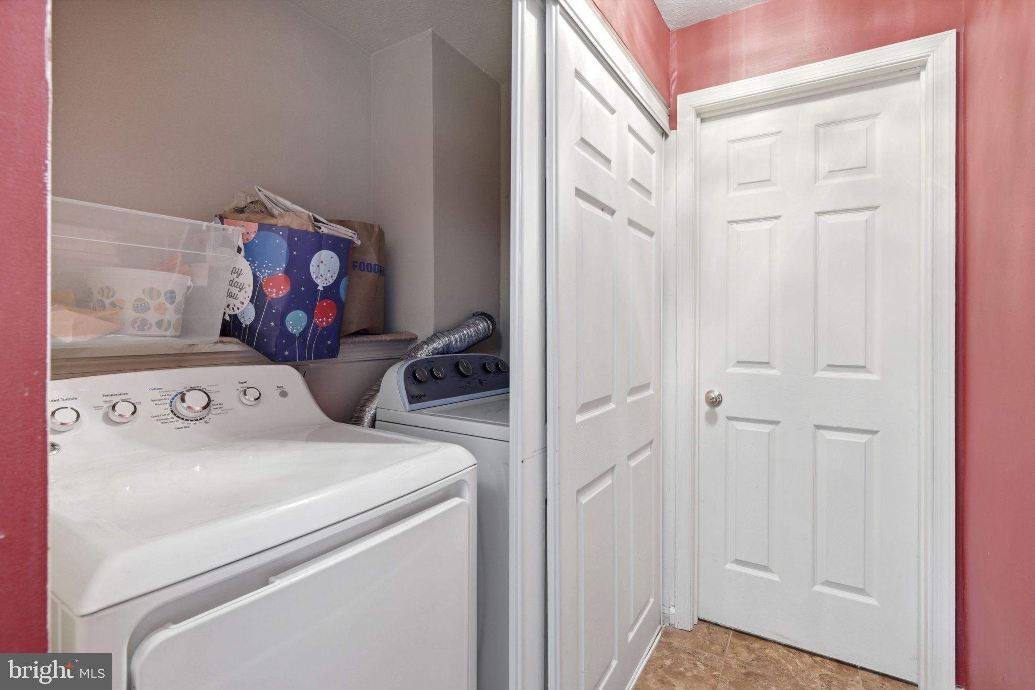 3413 Barkley Woods Road Baltimore, MD 21244 - Photo 19 of 31 a utility room with dryer and washer