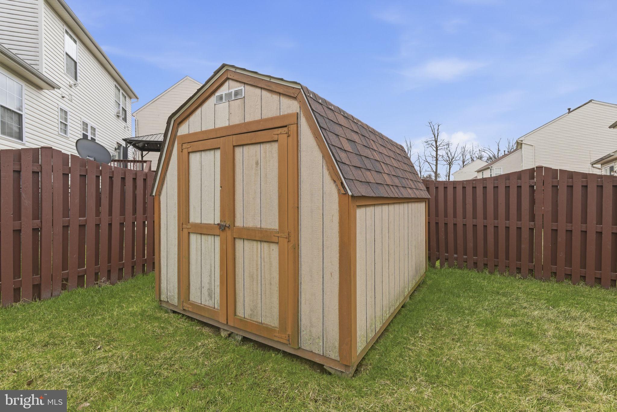 3413 Barkley Woods Road Baltimore, MD 21244 - Photo 21 of 31 a view of a front of house with parking area