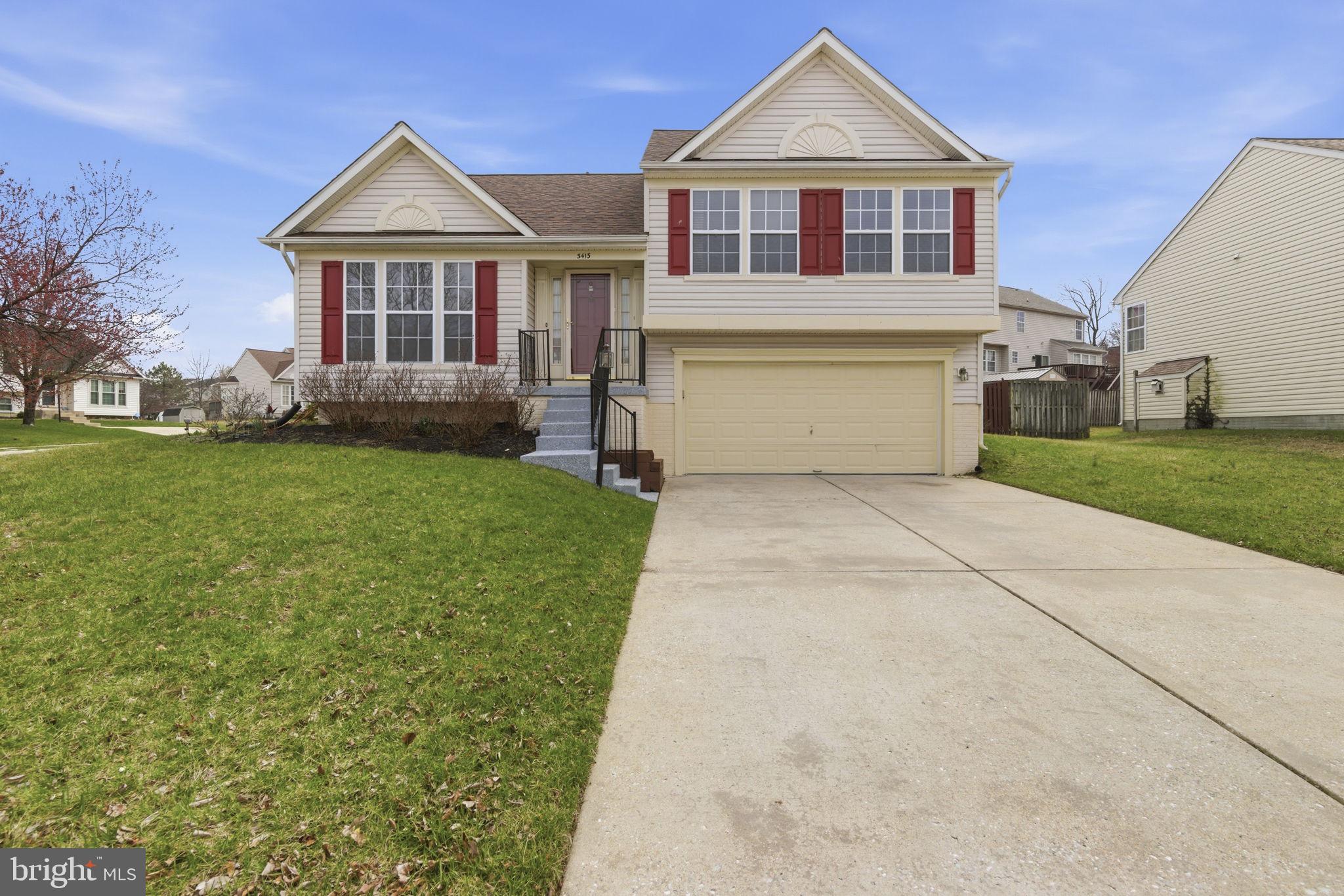 3413 Barkley Woods Road Baltimore, MD 21244 - Photo 25 of 31 a front view of a house with garden