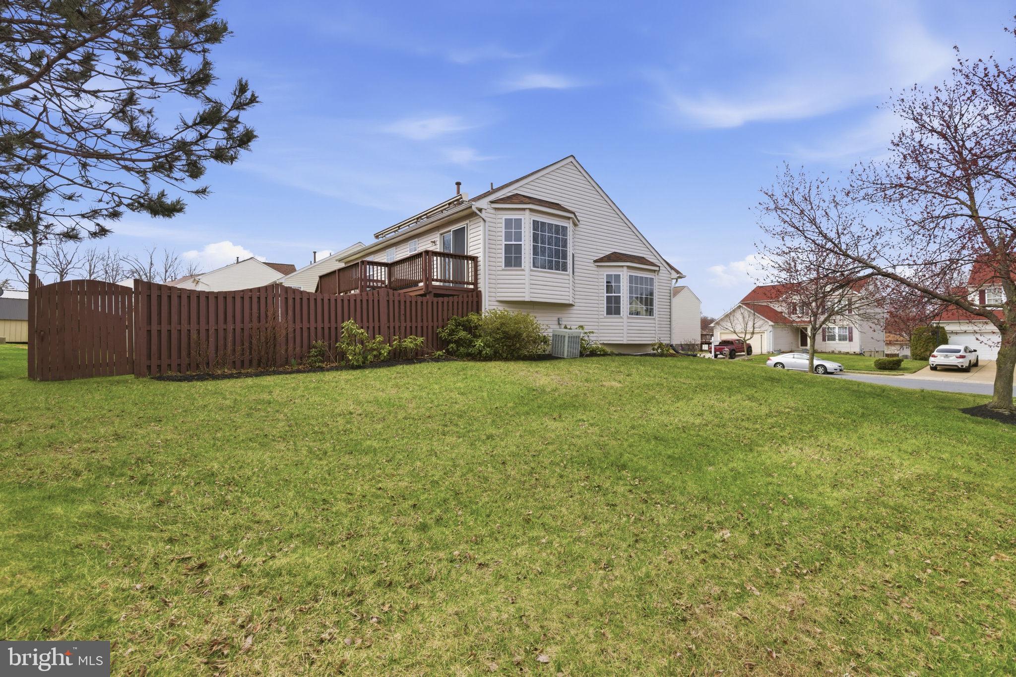 3413 Barkley Woods Road Baltimore, MD 21244 - Photo 28 of 31 a front view of house with yard and green space