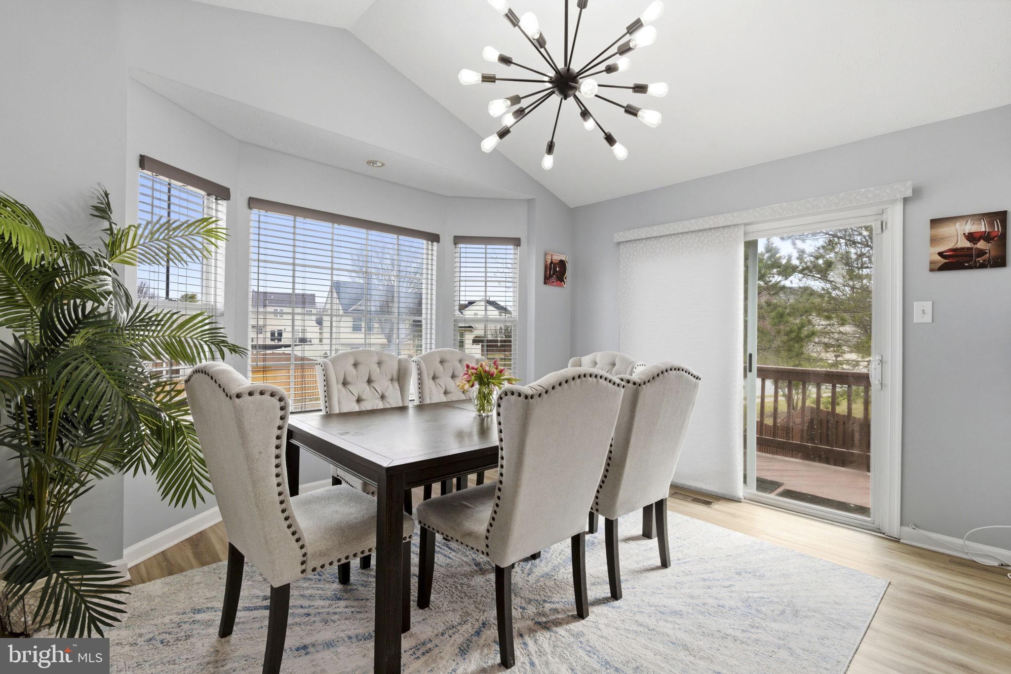 3413 Barkley Woods Road Baltimore, MD 21244 - Photo 6 of 31 a view of a dining room with furniture window and outside view