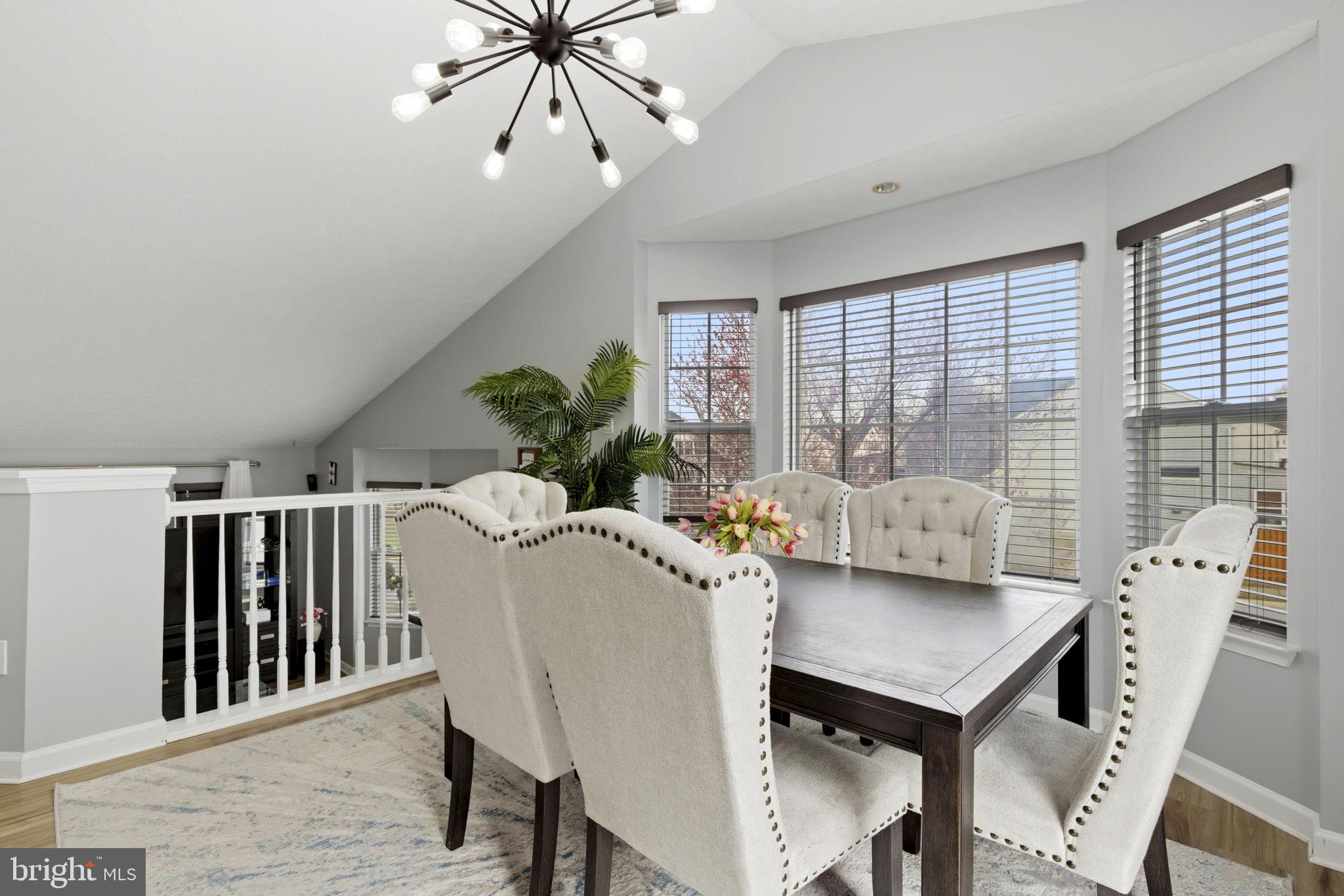 3413 Barkley Woods Road Baltimore, MD 21244 - Photo 7 of 31 a view of a dining room with furniture window and wooden floor