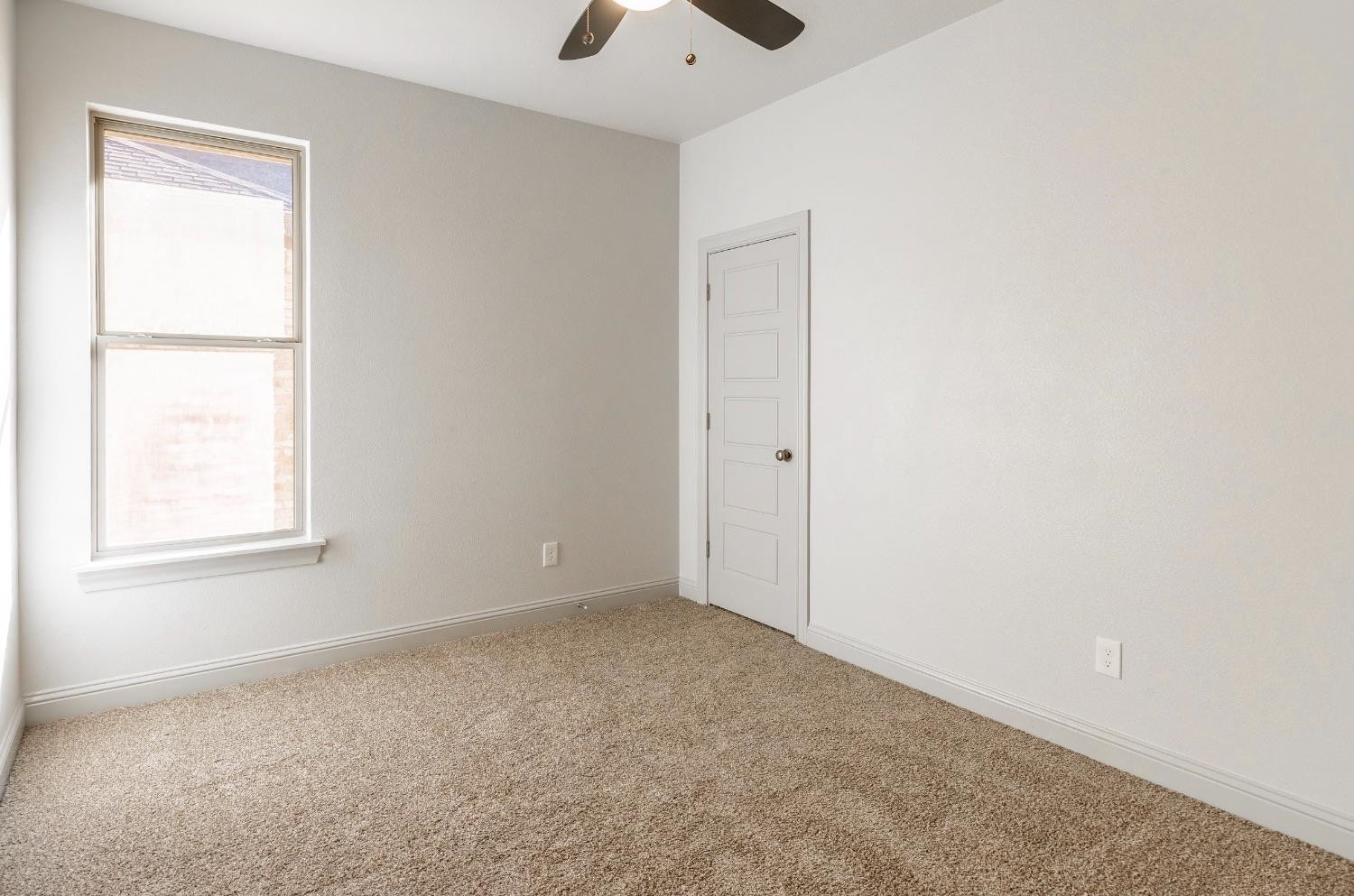 2726 138th Street Lubbock, TX 79423 - Photo 13 of 18 an empty room with a window