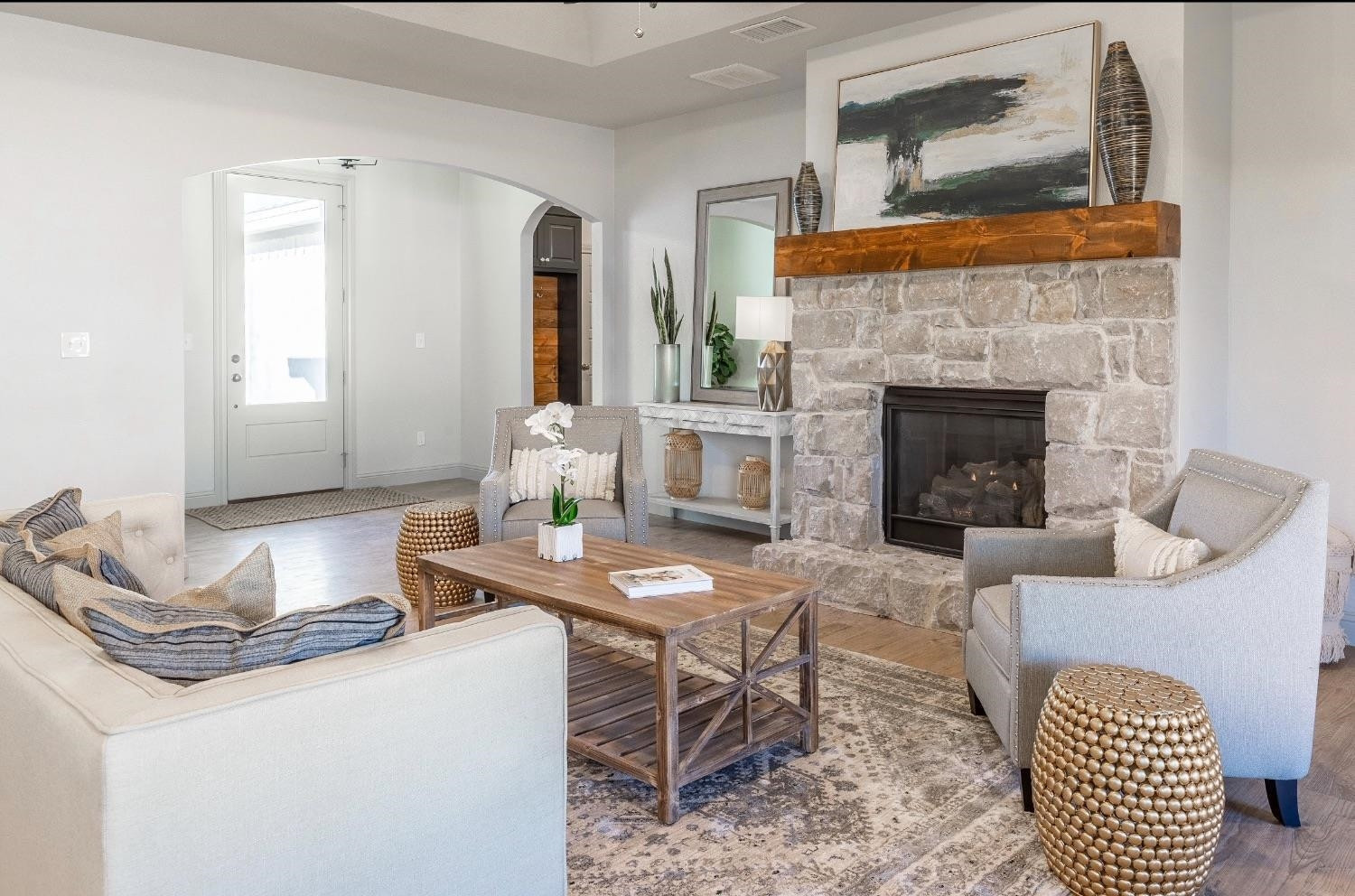 2726 138th Street Lubbock, TX 79423 - Photo 2 of 18 a living room with furniture and a fireplace