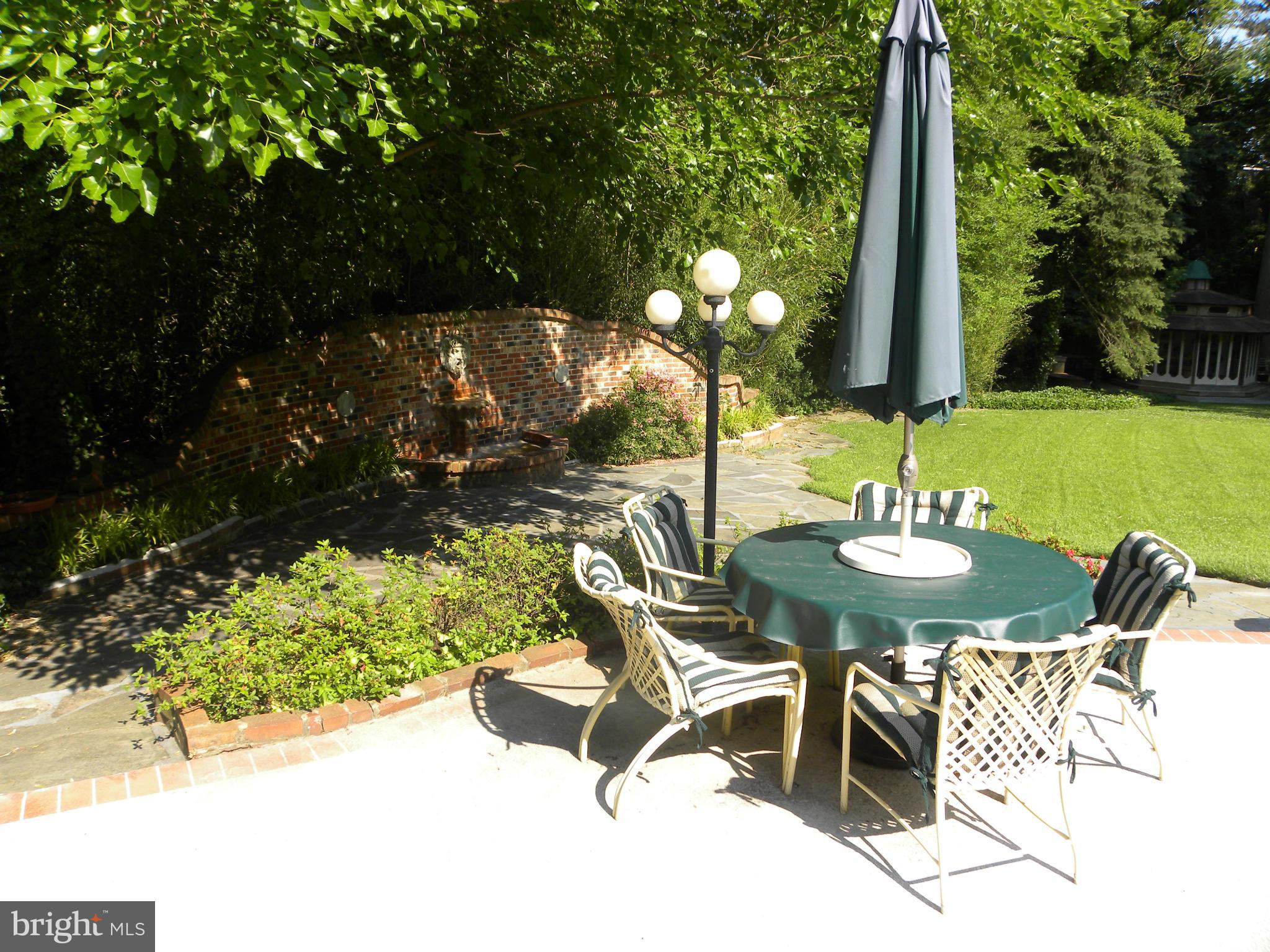 1913 Windsor Road Alexandria, VA 22307 - Photo 22 of 30 Terrace with Brick Wall