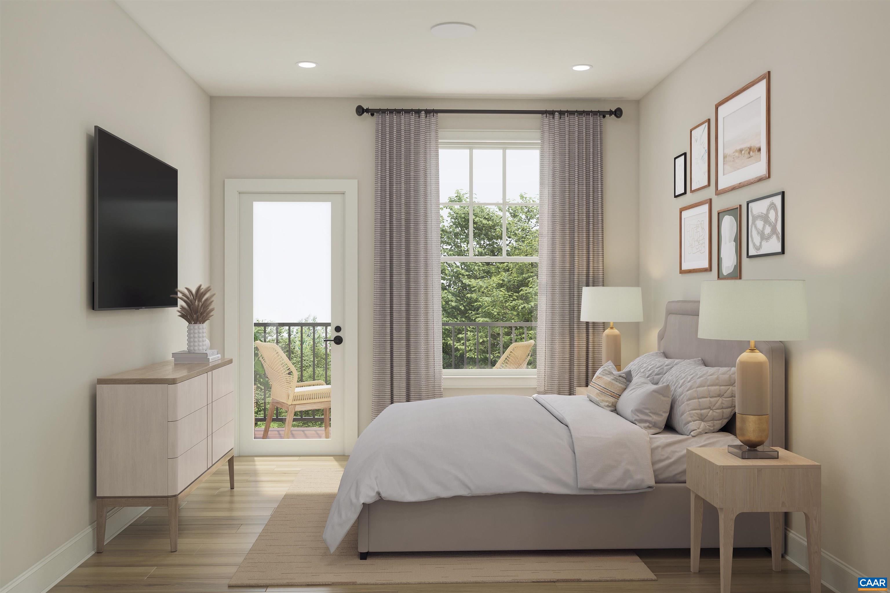 6 B Ryan Way Charlottesville, VA 22911 - Photo 7 of 10 a large bedroom with a bed and large window