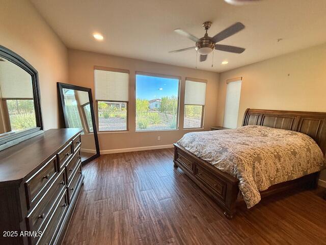 17259 East Woolsey Way Rio Verde, AZ 85263 - Photo 12 of 28 a spacious bedroom with a balcony a bed and a large window with wooden floor