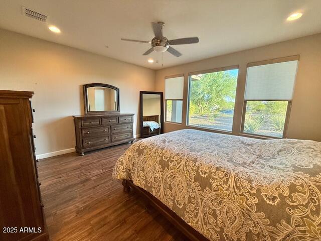 17259 East Woolsey Way Rio Verde, AZ 85263 - Photo 13 of 28 a spacious bedroom with a large bed and a dresser