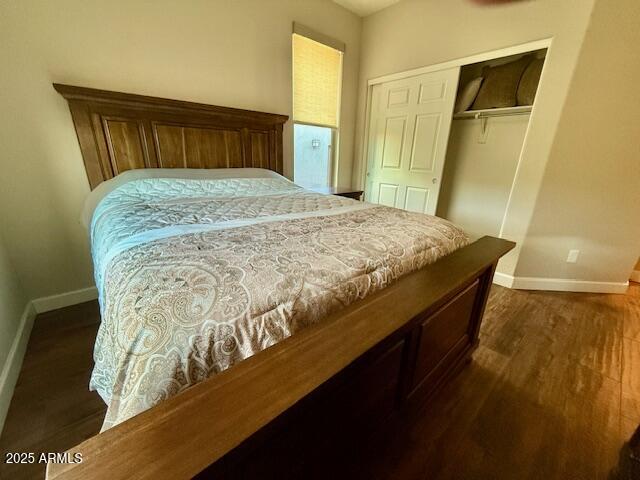 17259 East Woolsey Way Rio Verde, AZ 85263 - Photo 21 of 28 a bed sitting in a bedroom next to a window