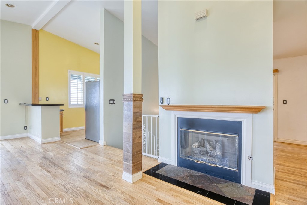 591 Devonwood Road Altadena, CA 91001 - Photo 21 of 51 a view of an empty room with window and wooden floor