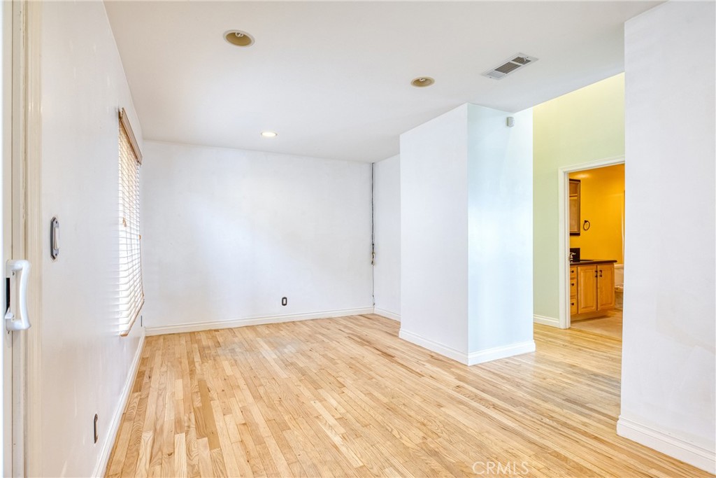 591 Devonwood Road Altadena, CA 91001 - Photo 28 of 51 a view of a room with wooden floor and a bathroom