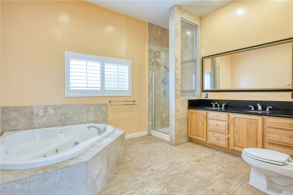 591 Devonwood Road Altadena, CA 91001 - Photo 45 of 51 a bathroom with a bathtub and a sink