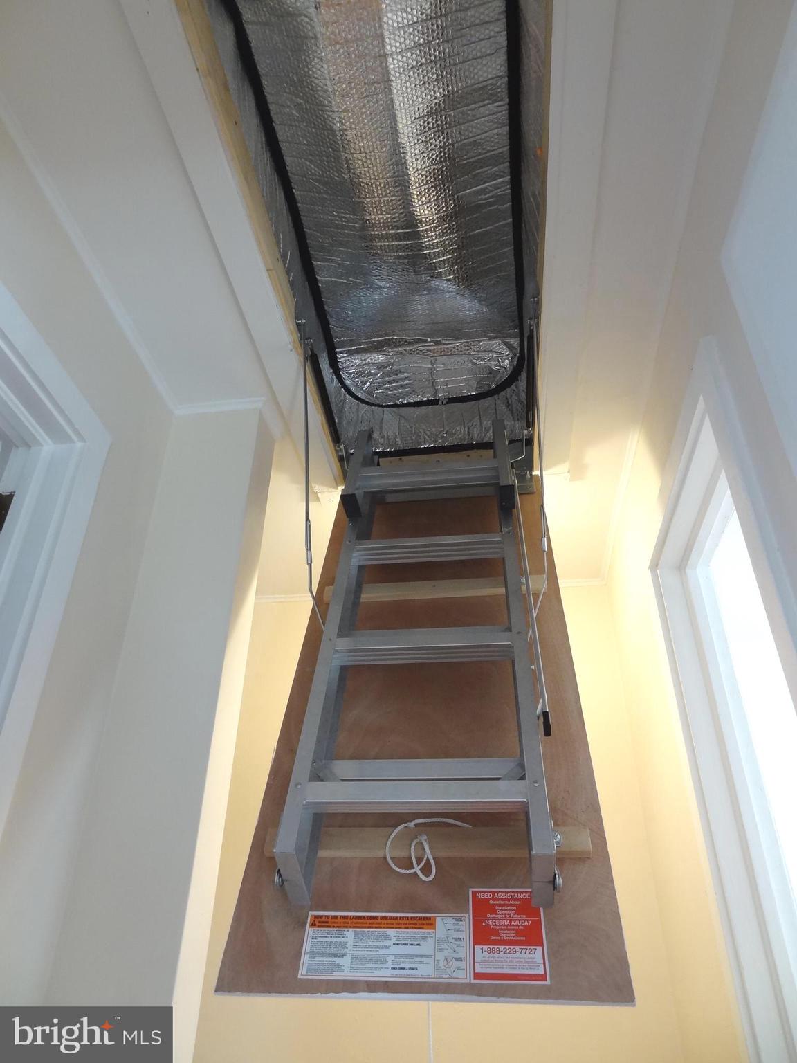 58 Ridge Road, Unit B Greenbelt, MD 20770 - Photo 14 of 15 New aluminum attic stairs