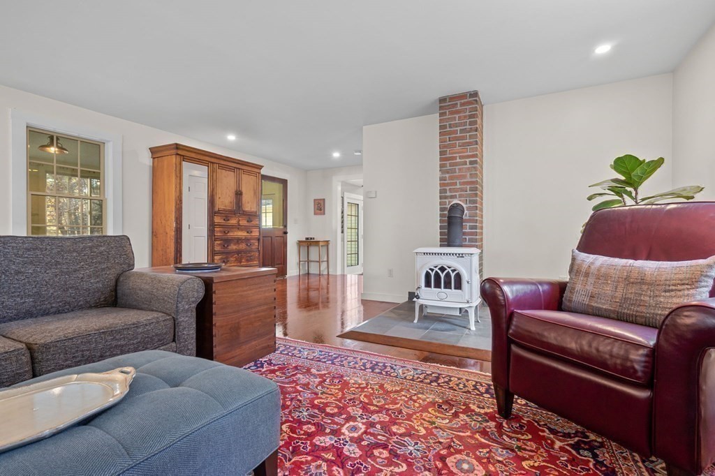 11 Boxford Road Topsfield, MA 01983 - Photo 16 of 34 a living room with furniture and a rug