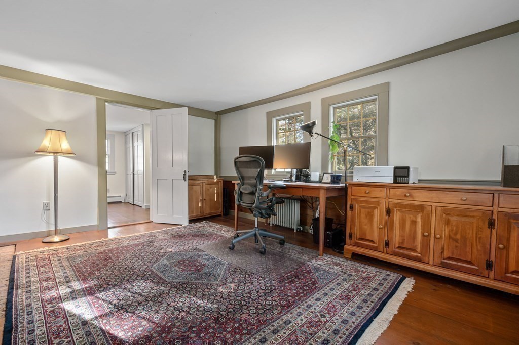 11 Boxford Road Topsfield, MA 01983 - Photo 18 of 34 a view of a workspace with furniture and a window
