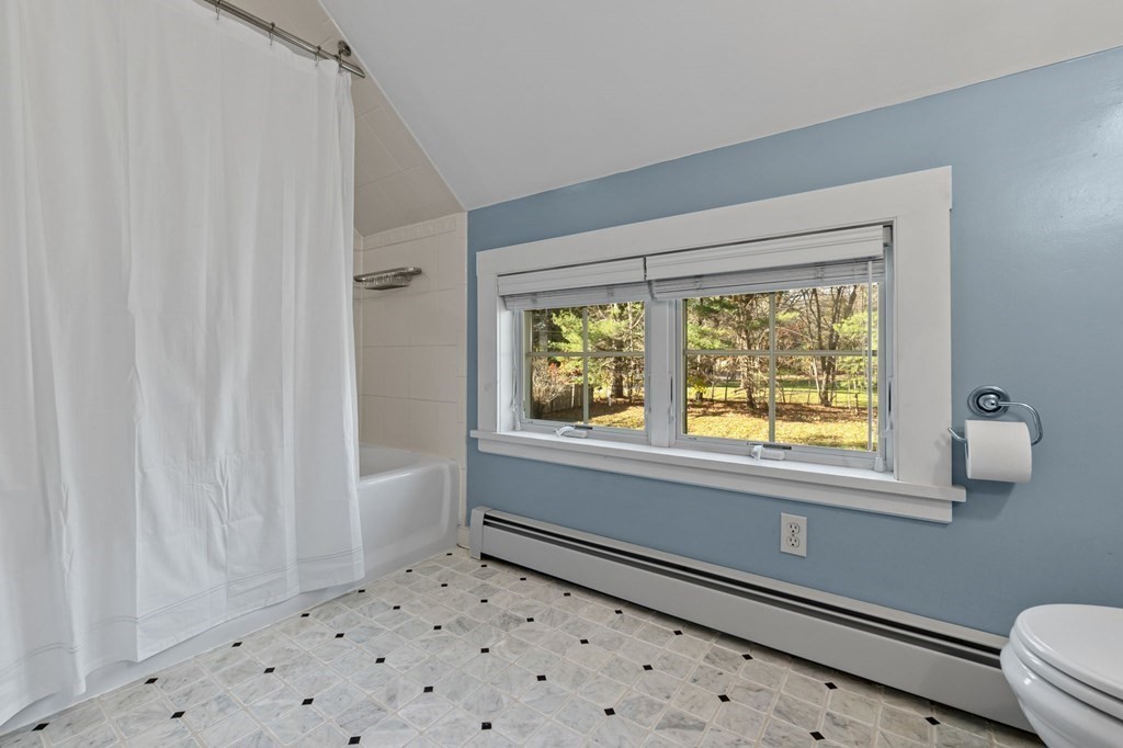11 Boxford Road Topsfield, MA 01983 - Photo 29 of 34 a bathroom with a window and a shower