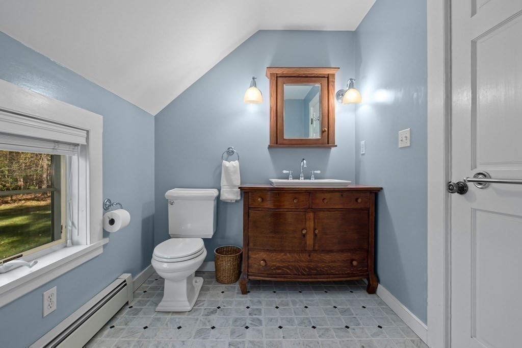 11 Boxford Road Topsfield, MA 01983 - Photo 30 of 34 a bathroom with a toilet a sink and a mirror