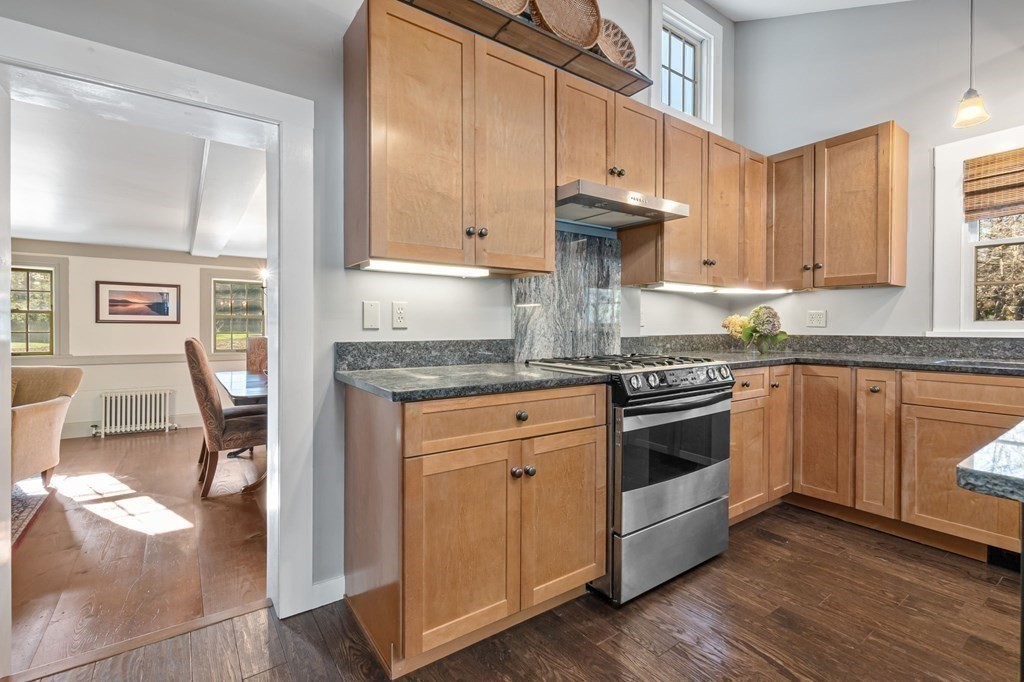11 Boxford Road Topsfield, MA 01983 - Photo 10 of 34 a kitchen with stainless steel appliances granite countertop a stove a sink and a refrigerator