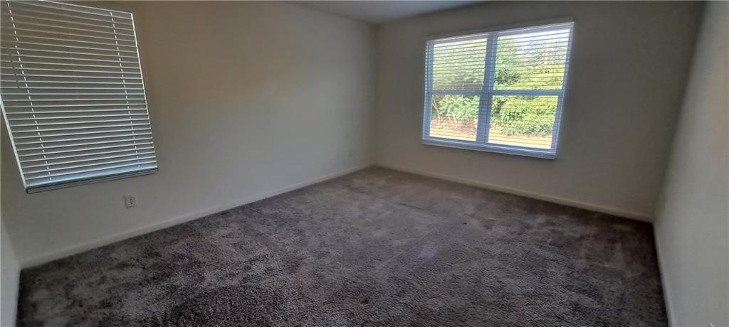 1683 Vernon Boulevard Decatur, GA 30035 - Photo 10 of 14 an empty room with a window