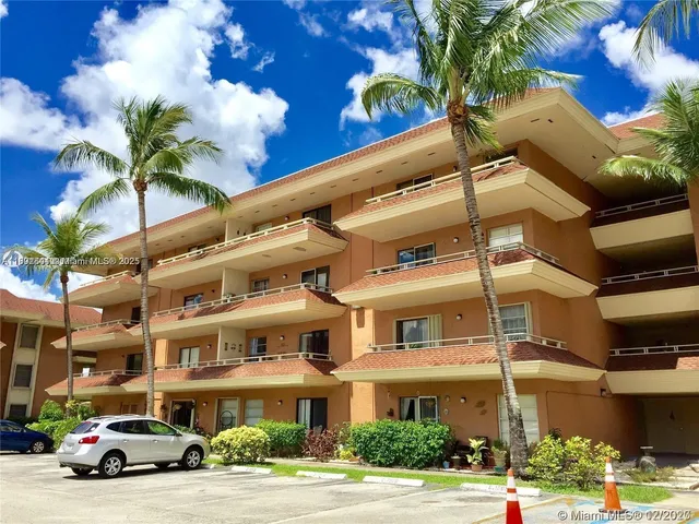 a car parked in front of a building
