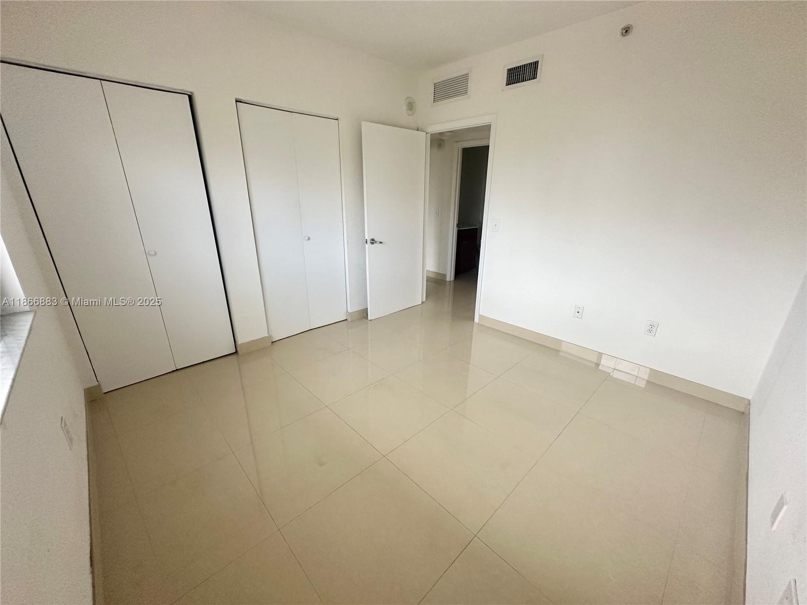 36 Northwest 6th Avenue, Unit 806 Miami, FL 33128 - Photo 13 of 23 a view of an empty room