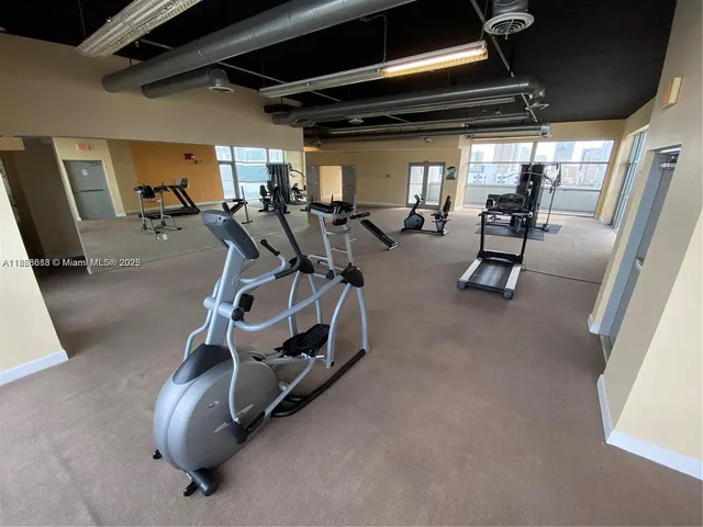 a view of a room with gym equipment