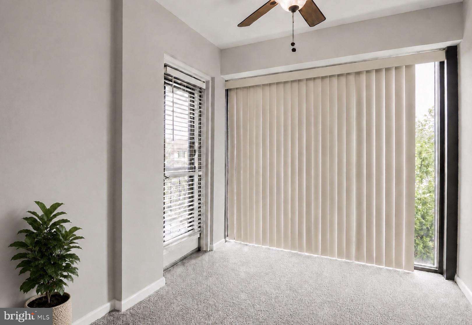 8 Juliet Lane, Unit 304 Nottingham, MD 21236 - Photo 8 of 10 a view of a room with a window and a potted plant
