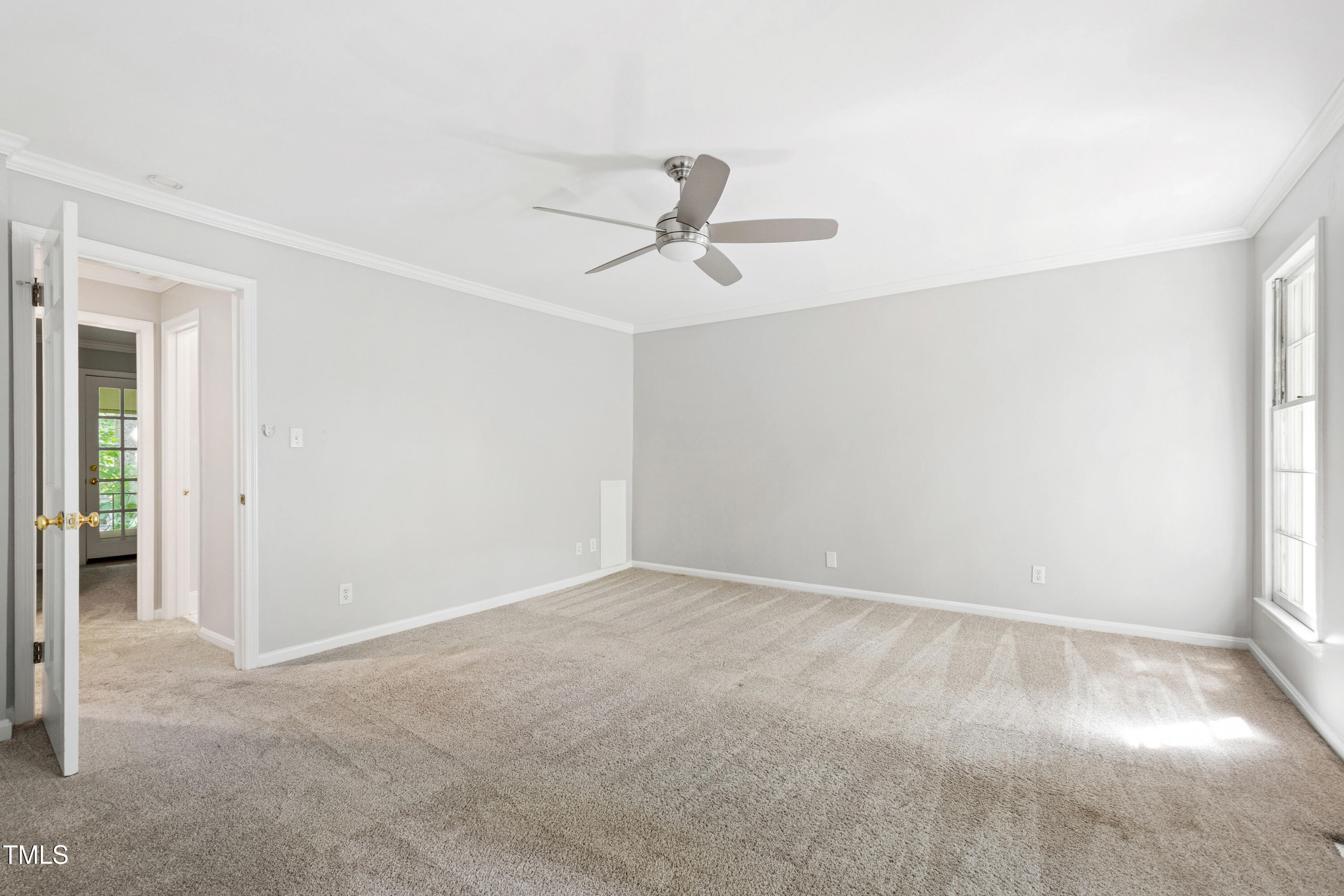 409 Smith Avenue, Unit 102 Chapel Hill, NC 27516 - Photo 18 of 35 an empty room with windows and fan