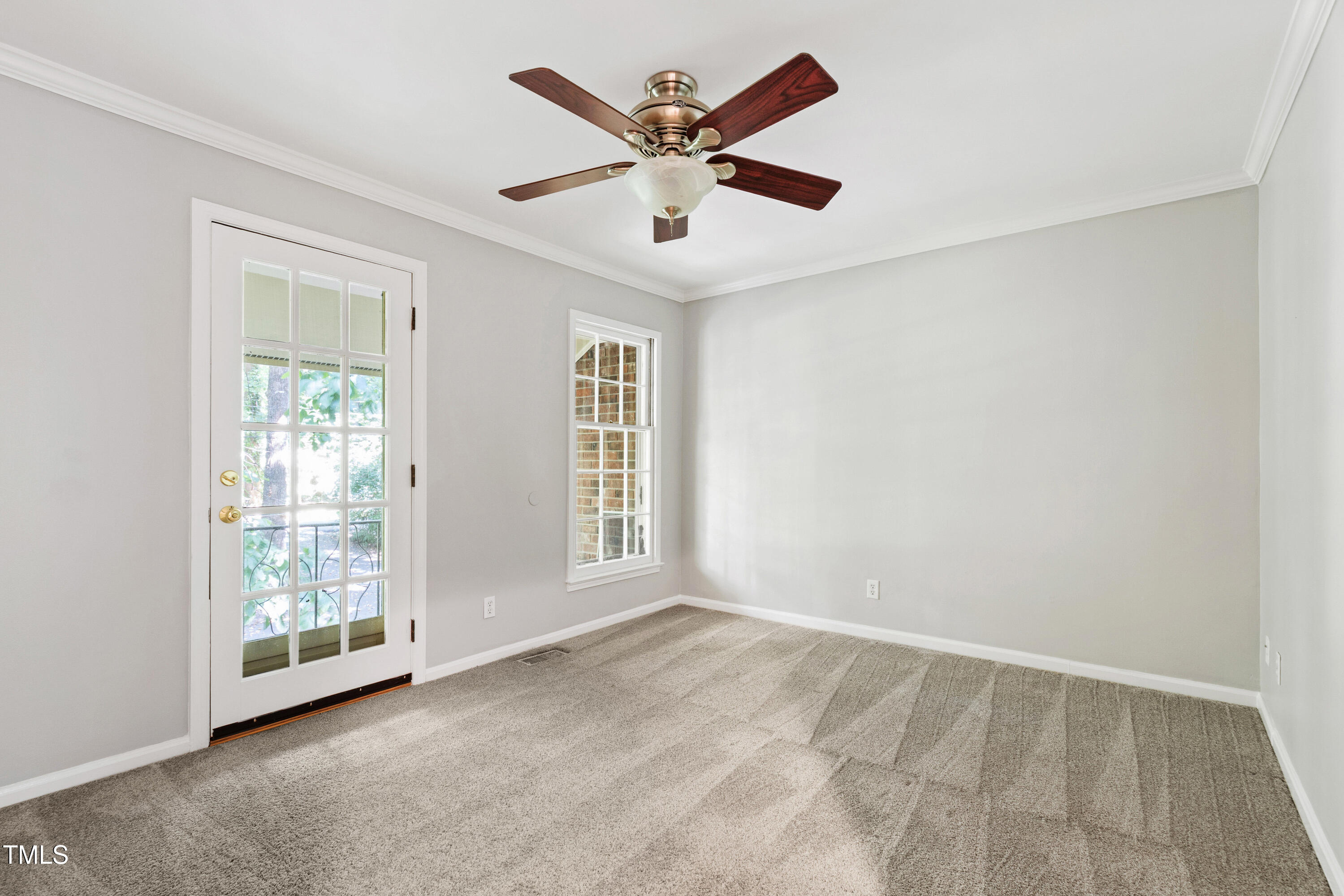 409 Smith Avenue, Unit 102 Chapel Hill, NC 27516 - Photo 21 of 35 a view of an empty room with a window