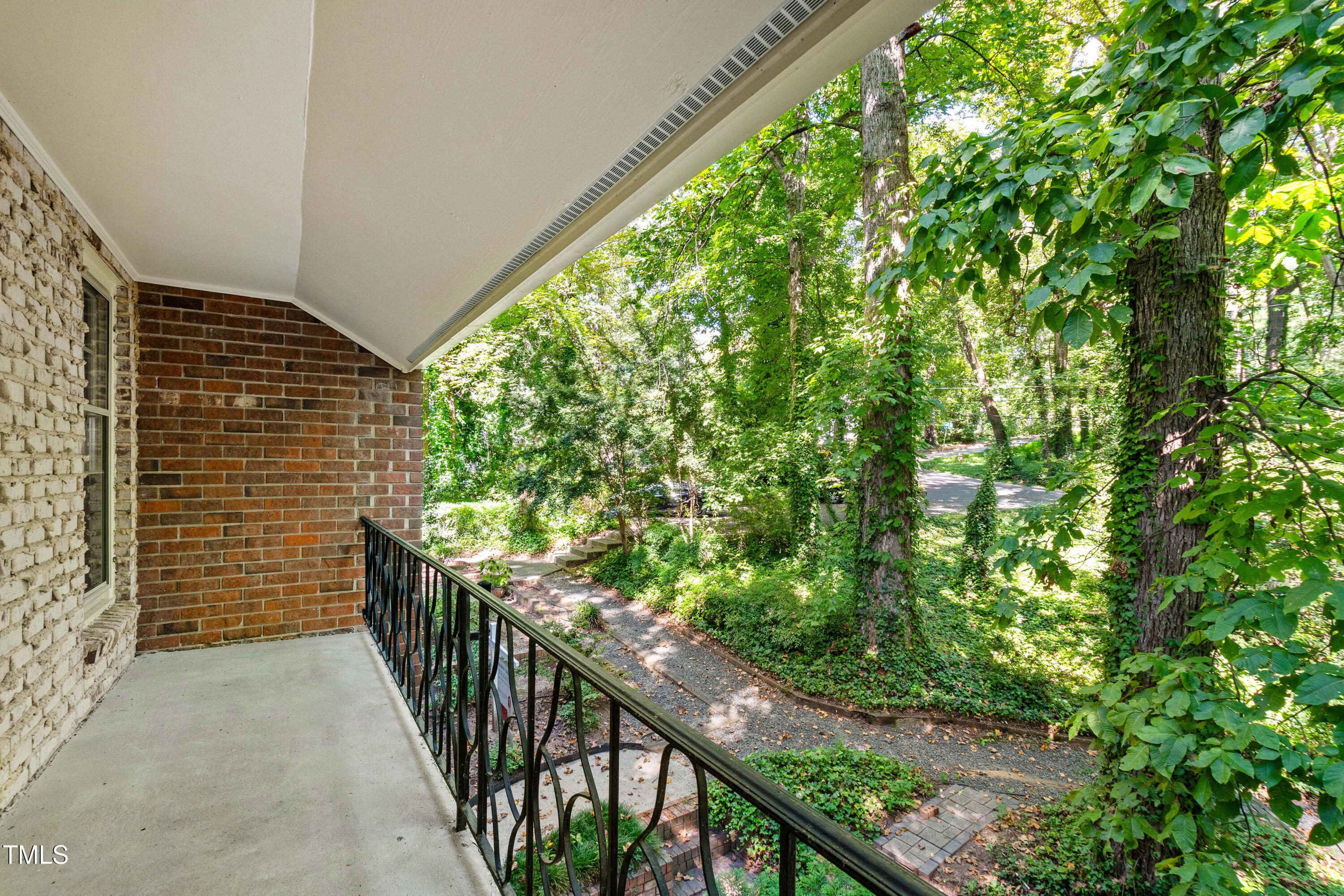 409 Smith Avenue, Unit 102 Chapel Hill, NC 27516 - Photo 4 of 35 a view of a pathway of a garden