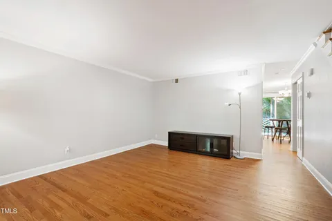 a view of a livingroom with wooden floor