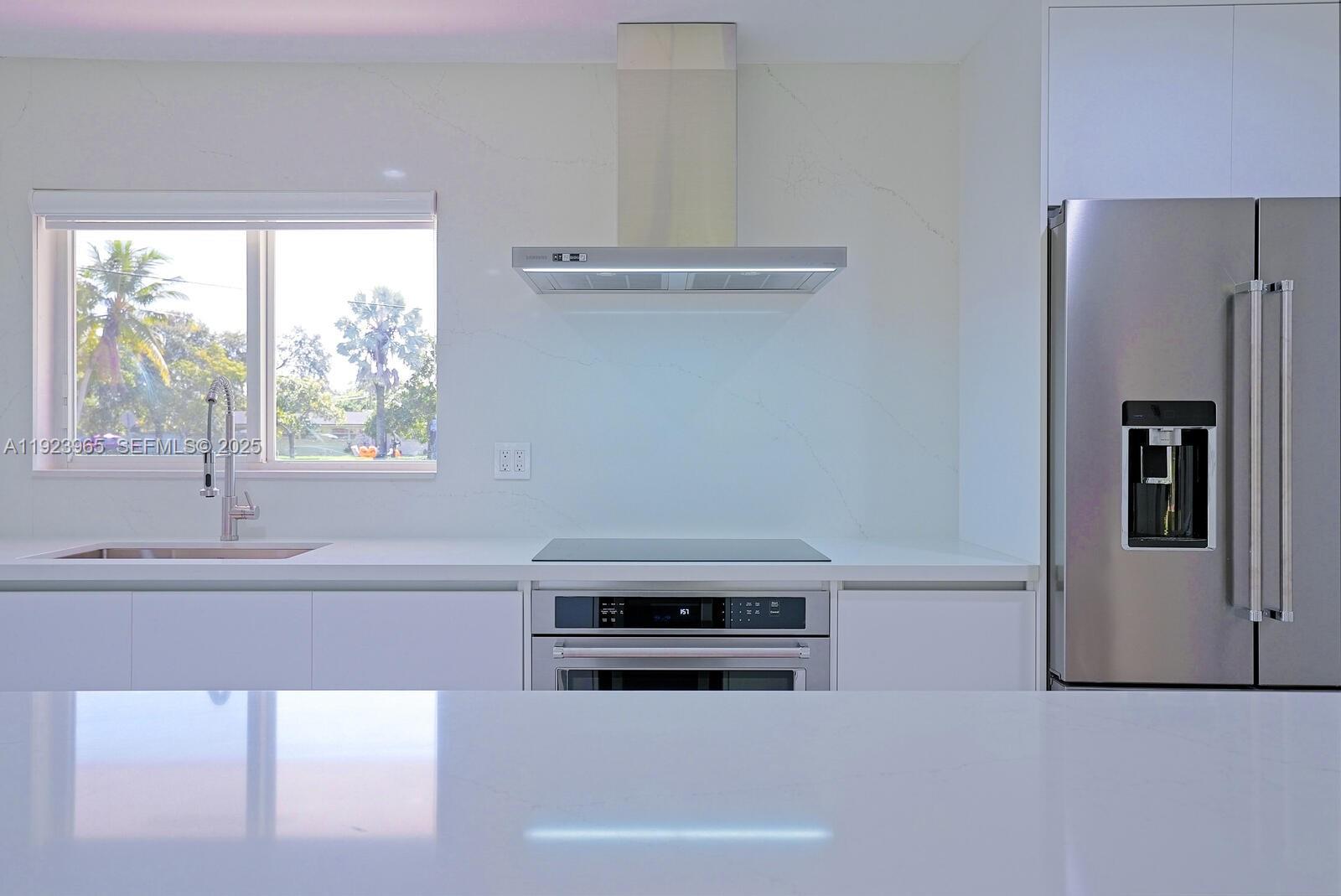 9301 Southwest 178th Street Palmetto Bay, FL 33157 - Photo 7 of 23 a bathroom with a bathtub and a sink