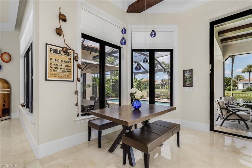 2220 Residence Circle Naples, FL 34105 - Photo 15 of 50 Dining area with beamed ceiling and ornamental molding