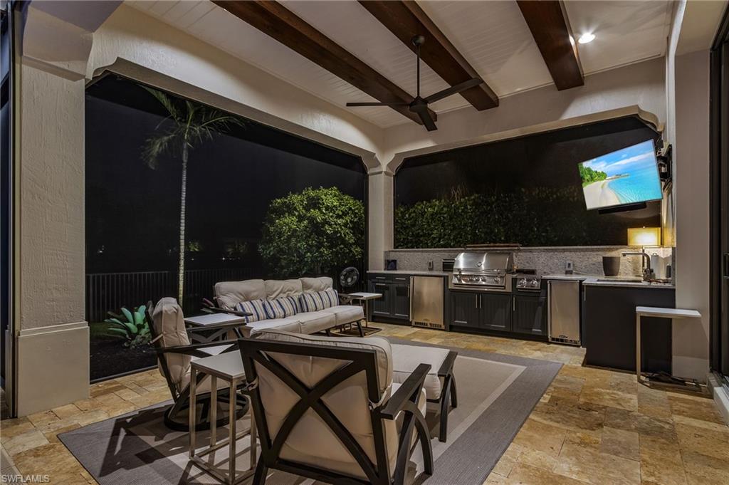 2220 Residence Circle Naples, FL 34105 - Photo 30 of 50 View of patio / terrace featuring area for grilling, ceiling fan, and outdoor lounge area