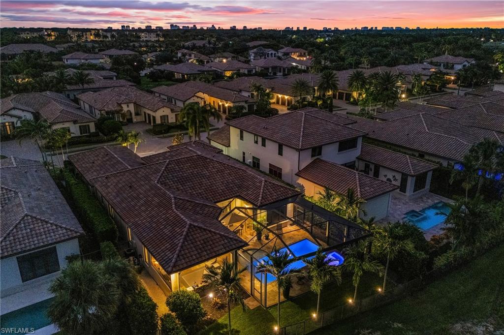 2220 Residence Circle Naples, FL 34105 - Photo 50 of 50 Aerial view at dusk of a residential view
