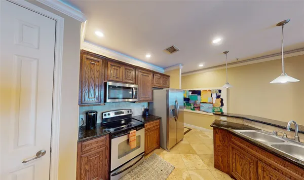 $255,000 | 7039 Kingston Cove Lane, Unit 307, Willis, TX 77318