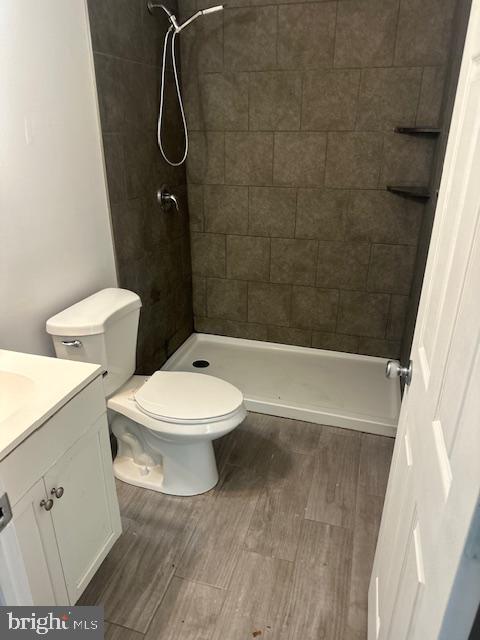 407 Wilson Road, Unit B Blackwood, NJ 08012 - Photo 5 of 8 a white toilet sitting next to a bath tub and shower